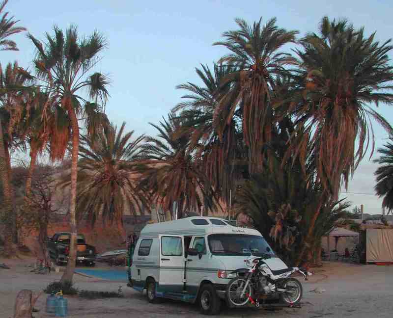 Roadtrek with Motorcycle loaded at dawn in Baja